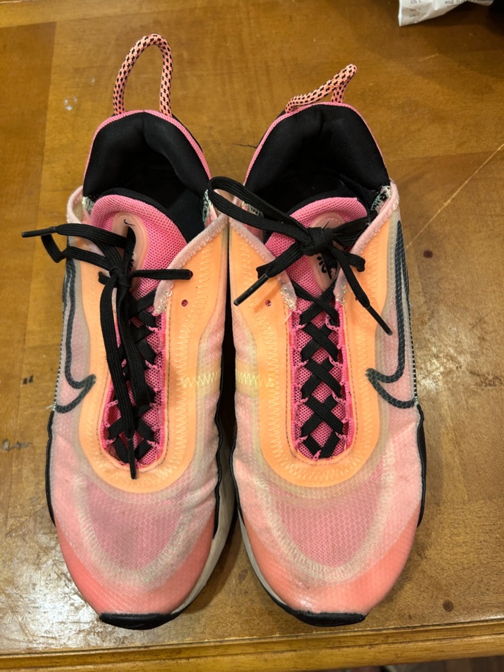 Nike Women’s Peach and Pink Athletic Sneakers with Black Accents